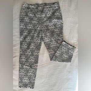 Chico’s size 14R ankle-length pants. White & black print. Usable front pockets!